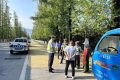 漢中交警二大隊積極治理占道曬糧安全隱患縮略圖